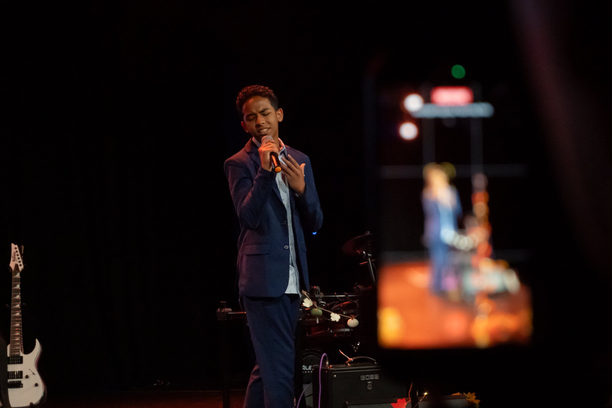 Teen vocalist performing