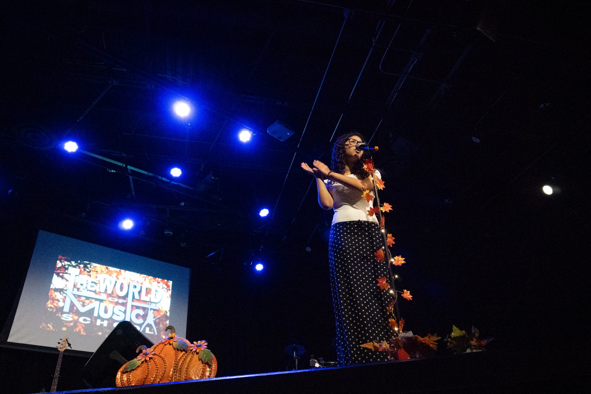 Young drummer performing on stage